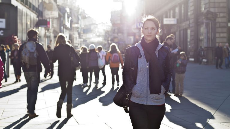 woman walking down street